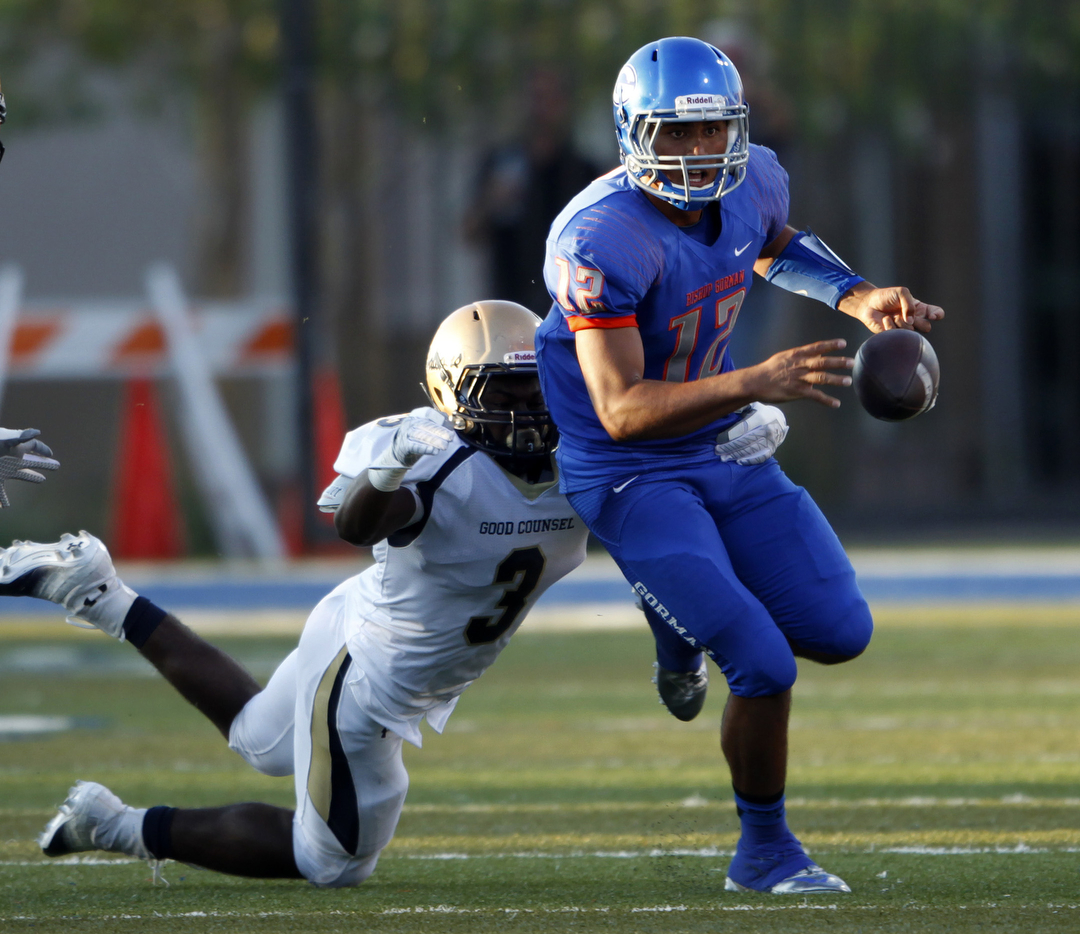 Darien Carr of Our Lady of Good Counsel High School forces Bishop Gorman quarterback Jarrett ...