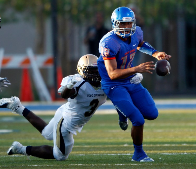 Darien Carr of Our Lady of Good Counsel High School forces Bishop Gorman quarterback Jarrett ...