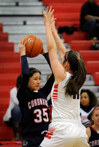 Coronado’s Taylor Tyrell (35) looks to pass against Liberty’s Nancy Caballero on ...