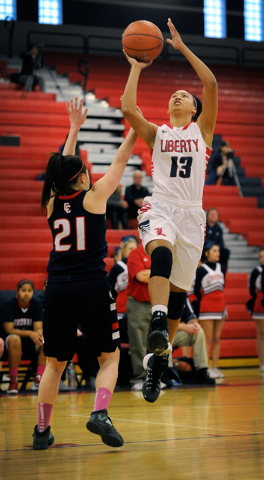 Liberty’s Aubre Fortner (13) shoots over Coronado’s Skylar Feldman on Tuesday. ( ...