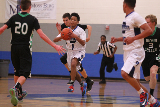 Desert Pines’ Capri Uzan (1) looks to pass the ball as Virgin Valley’s Garrett L ...