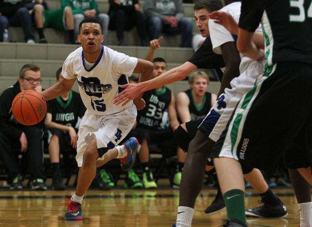 Desert Pines’ Coby Myles (15) drives on Friday against Virgin Valley. Myles had 20 poi ...