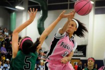 Canyon Springs’ Cherise Beynon (3) blocks a shot by Green Valley’s Milena Palor ...