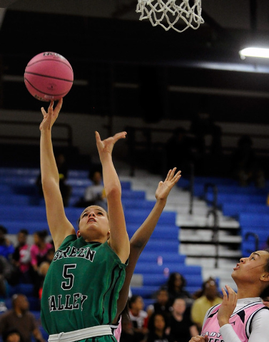 Green Valley’s Milena Palor shoots the ball over Canyon Springs’ Daijhan Cooks o ...