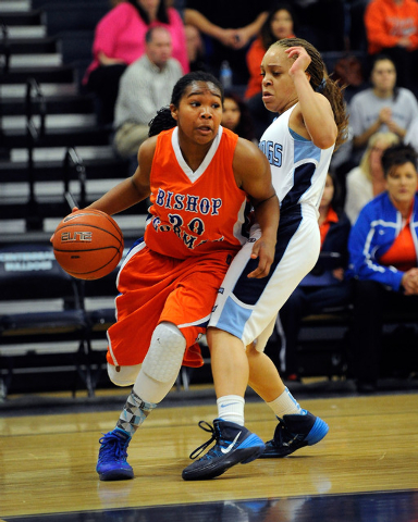 Bishop Gorman’s Skylar Jackson drives to the basket against Centennial’s Tramina ...