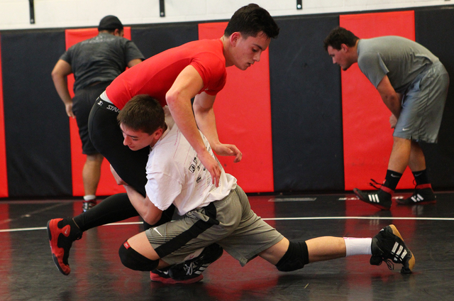 Liberty’s Storm Roper, right, wrestles against Las Vegas High’s Antonio Jauregui ...