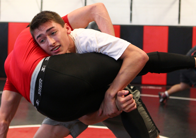 Liberty’s Storm Roper, right, wrestles against Las Vegas High’s Antonio Jauregui ...