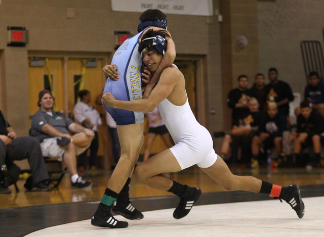 Liberty’s Michael Martinez, right, prepares to take down Foothill’s Albert Chave ...