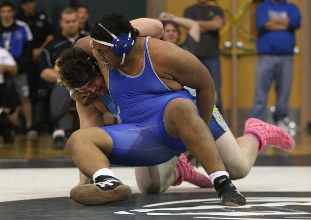 Basic’s Jotasem Funaki, right, wrestles Foothill’s Dylan Weasa during the 285-po ...