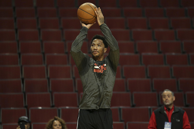 Mar 23, 2015; Chicago, IL, USA; Chicago Bulls guard Derrick Rose (1) shoots before the NBA game against the Charlotte Hornets at United Center. (Kamil Krzaczynski-USA TODAY Sports)