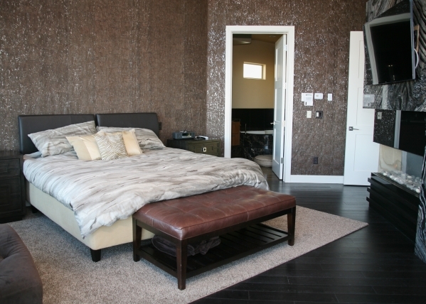 The bedrooms have an expensive, unusual wall covering that blends thin layer of cork with metallic leafing, creating dark and light on the wall. ELKE COTE/REAL ESTATE MILLIONS