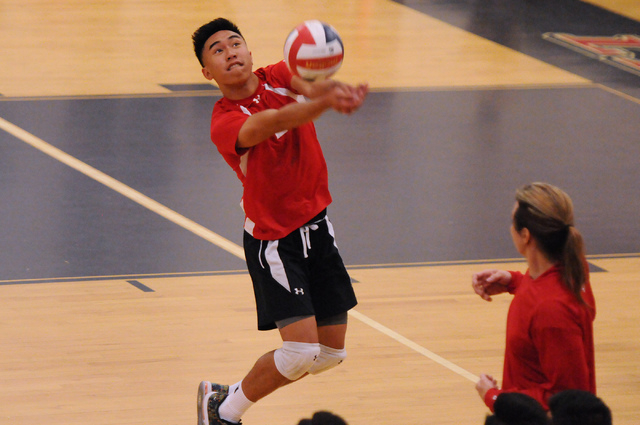 Las Vegas’ T.J. Esporas (2) saves the ball during the Sunrise Region boys volleyball c ...