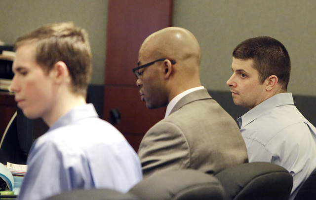 Sinder Holmes, left, and Matthew Goin, right, appear with Goin's attorney Jonathan MacArthur, center, at the Regional Justice Center on Wednesday, May 18, 2016. Goin and Holmes admitted to raping  ...