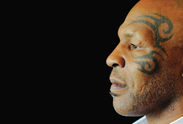 Mike Tyson, whose one-man stage show is chronicled by director Spike Lee in &quot;Mike Tyson: Undisputed Truth,&quot; poses backstage during HBO's Summer 2013 TCA panel at the Beverly Hilt ...