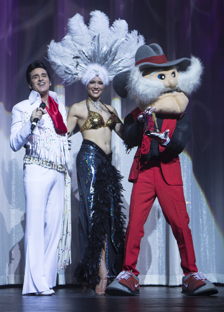 Steve Connolly, left, presents UNLV's mascot, Hey Reb, an award during the Best of Las Vegas Show at The Venetian Las Vegas hotel-casino on Saturday, Nov. 5, 2016. Loren Townsley/Las Vegas Review- ...