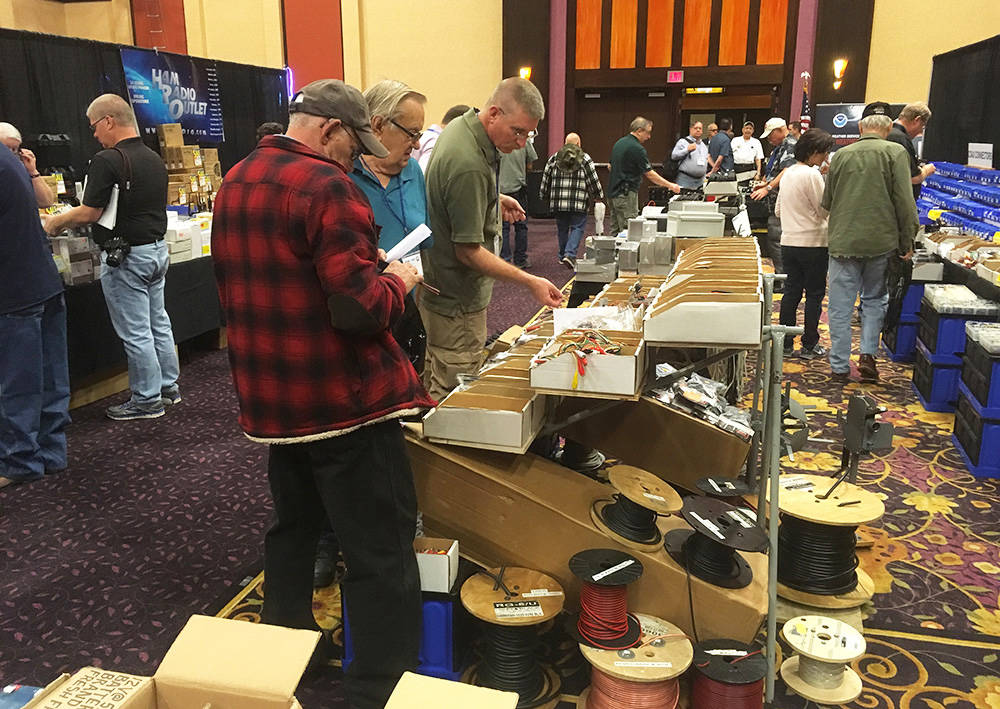 Attendees view the wares April 1 on the second day of the three-day American Radio Relay League ...
