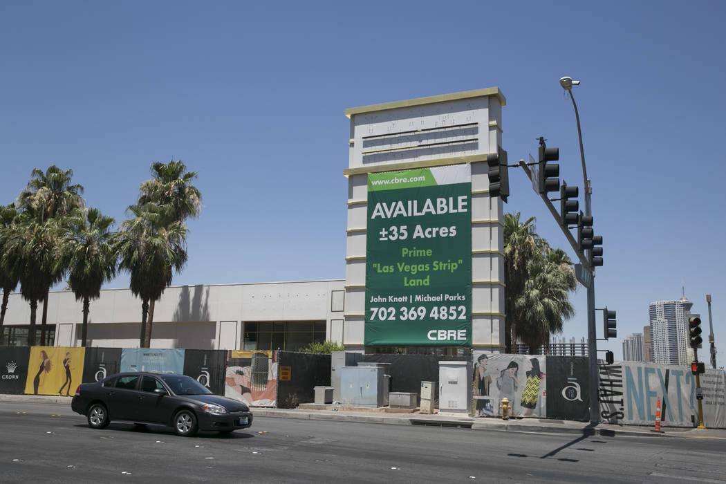 A for sale sign is seen at the site of the never-built Alon casino-resort at the corner of Las Vegas Boulevard and Fashion Show Drive in Las Vegas, Thursday, June 22, 2017. (Gabriella Angotti-Jone ...