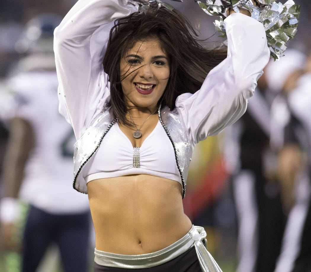 A Raiderette performs at a NFL preseason game against the Seattle Seahawks in Oakland, Calif., Thursday, Aug. 31, 2017. Heidi Fang Las Vegas Review-Journal @HeidiFang