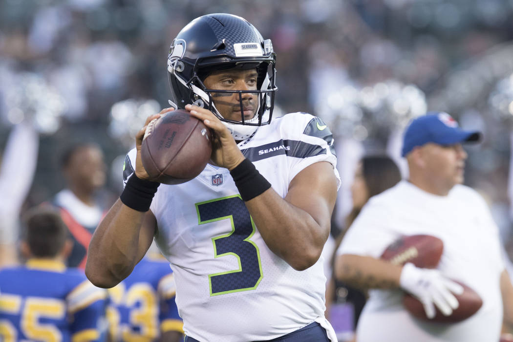 Seattle Seahawks quarterback Russell Wilson (3) executes drills before their preseason game against the Oakland Raiders in Oakland, Calif., Thursday, Aug. 31, 2017. Heidi Fang Las Vegas Review-Jou ...
