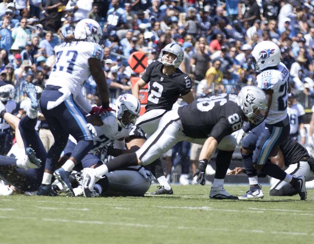 Oakland Raiders kicker Giorgio Tavecchio adds the extra point after Oakland Raiders wide receiver Amari Cooper (89) touchdown in the first quarter against the Tennessee Titans at the Nissan Stadiu ...