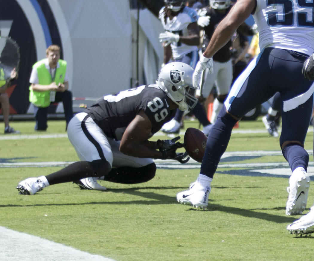 Oakland Raiders wide receiver Amari Cooper (89) drops the football in the end zone in the first half of the NFL game against the Tennessee Titans at the Nissan Stadium in Nashville, Tenn., Sunday, ...