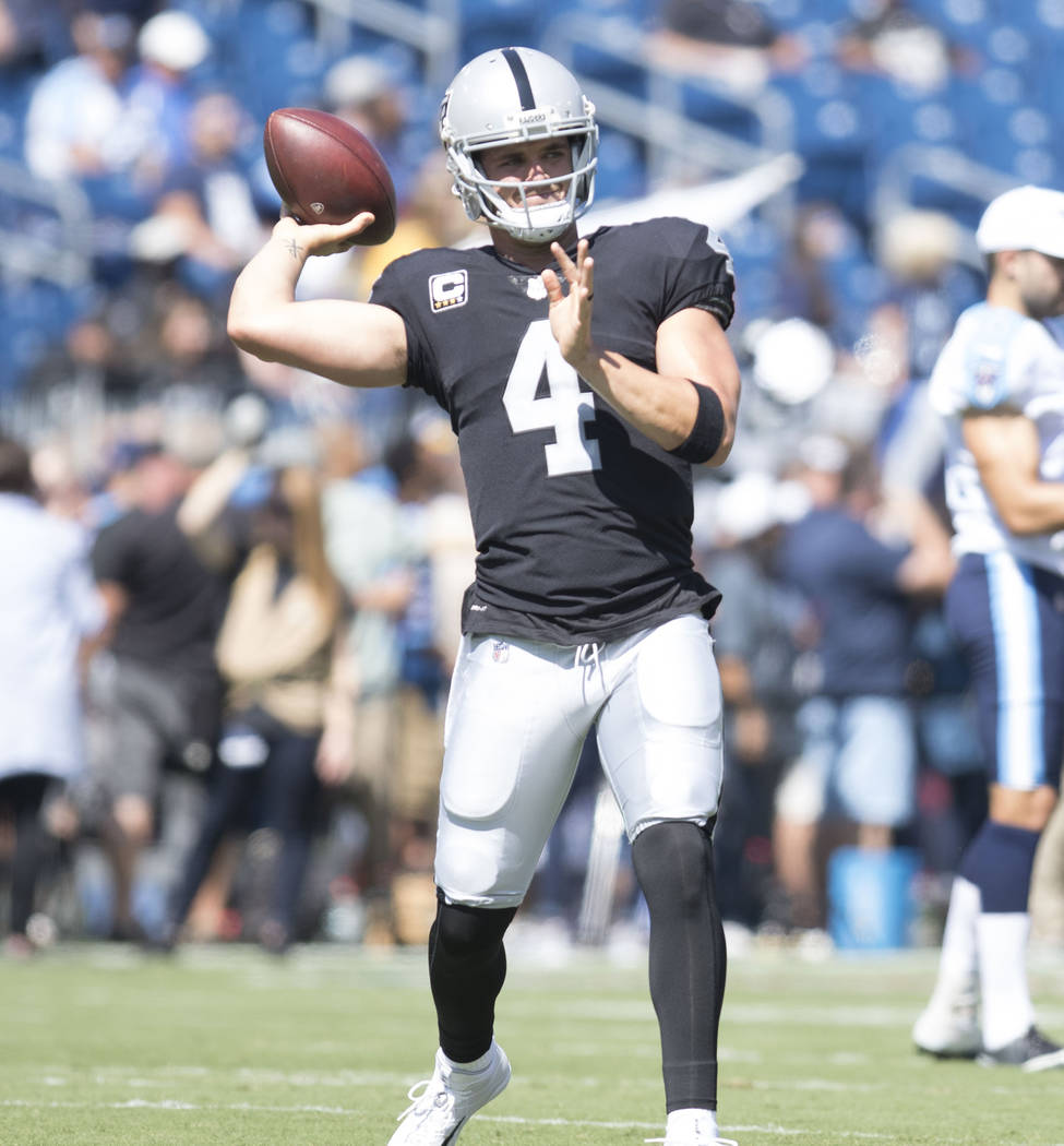 Oakland Raiders quarterback Derek Carr (4) throws a pass prior to the team's game against the Tennessee Titans at the Nissan Stadium in Nashville, Tenn., Sunday, Sept. 10, 2017. Heidi Fang Las Veg ...