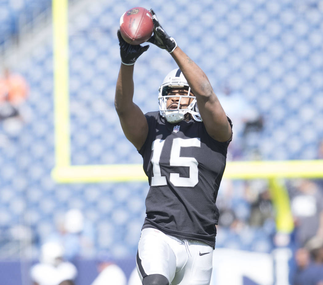 Oakland Raiders wide receiver Michael Crabtree (15) catches a pass prior to the team's game against the Tennessee Titans at the Nissan Stadium in Nashville, Tenn., Sunday, Sept. 10, 2017. Heidi Fa ...