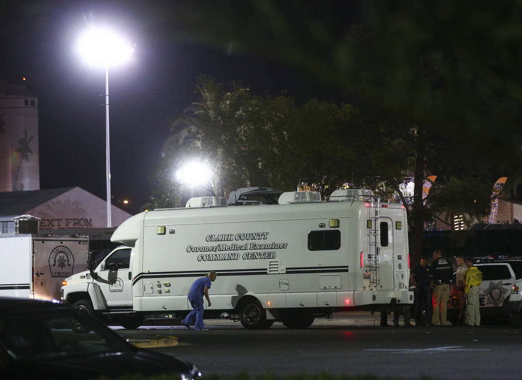The Clark County Coroner arrives as Las Vegas police investigate following an active shooter situation that left 50 dead and over 200 injured on the Las Vegas Strip during the early hours of Monda ...