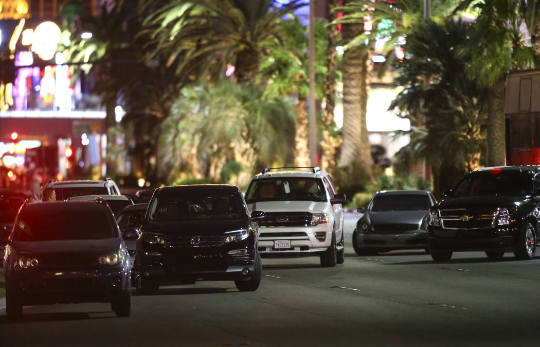 Cars left on Las Vegas Boulevard following an active shooter situation that left 50 dead and over 200 injured on the Las Vegas Strip during the early hours of Monday, Oct. 2, 2017. Chase Stevens L ...