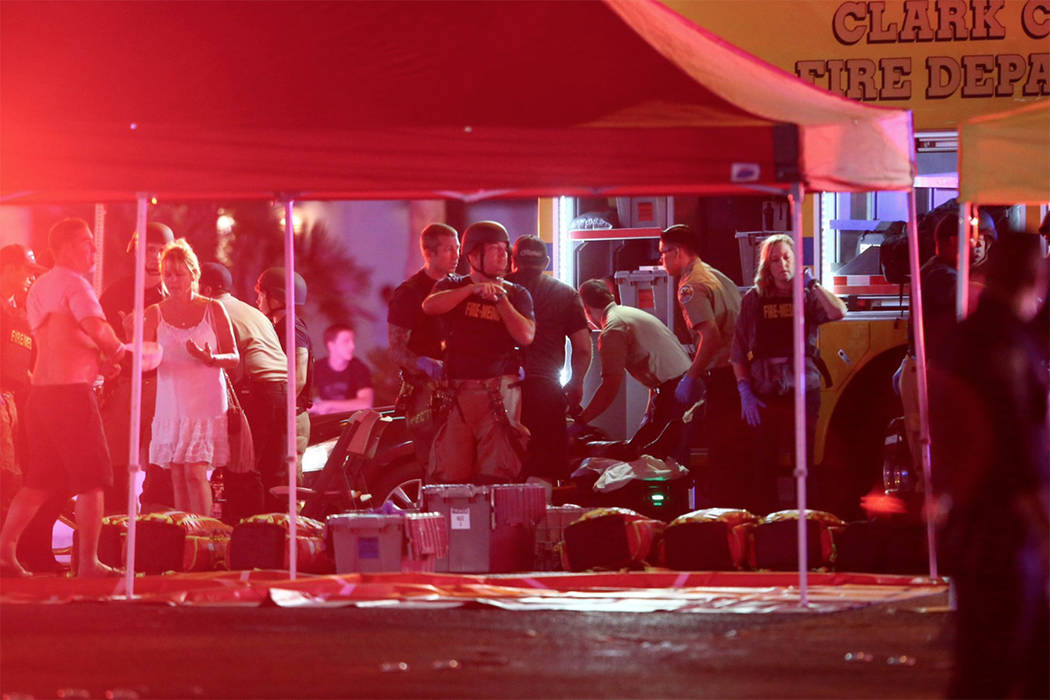 Las Vegas police have set up a staging area near Tropicana Avenue and Las Vegas Boulevard as they investigate reports of multiple shootings Sunday night. (Chase Stevens/Las Vegas Review-Journal)