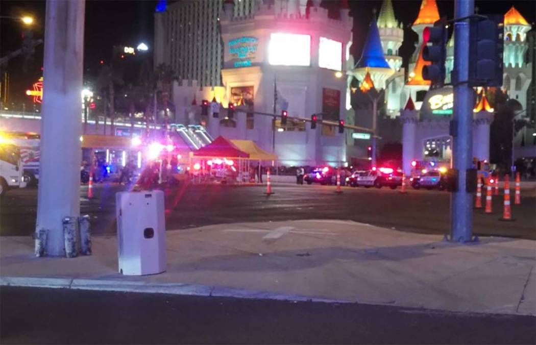 Las Vegas police converge at the corner of Tropicana Avenue and Las Vegas Boulevard.