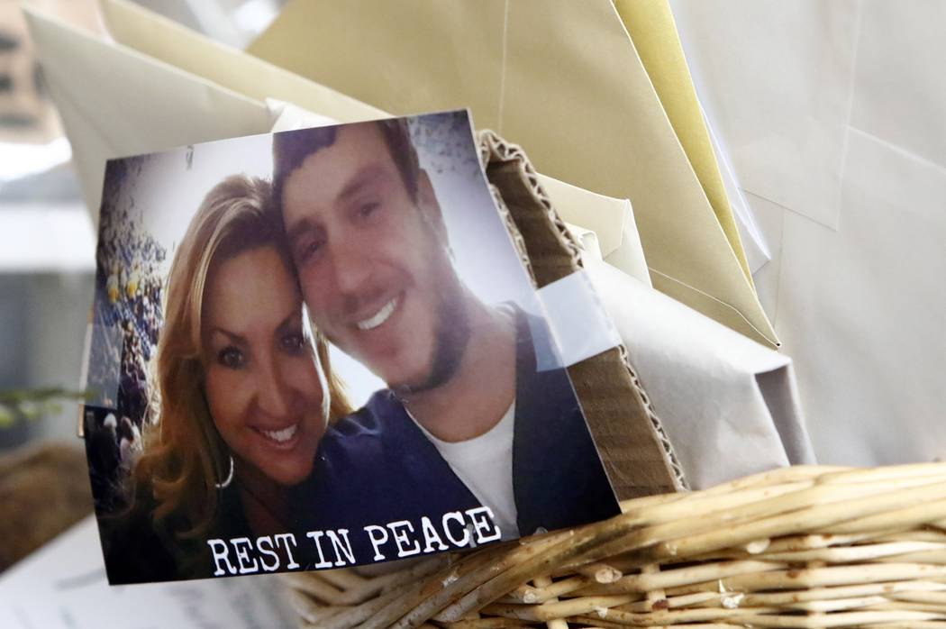 A photo of Sonny Melton and his wife, Heather is seen tapped to a basket of cards and letter be ...