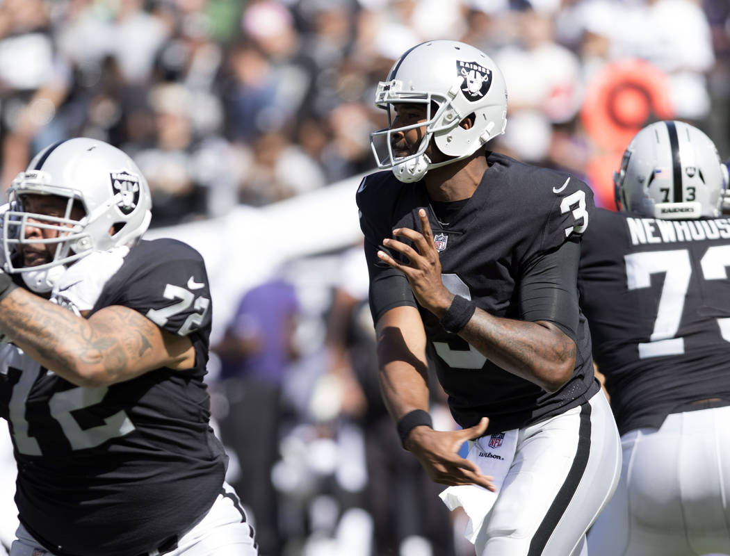 Oakland Raiders quarterback EJ Manuel (3) throws the football in the first half of their game against the Baltimore Ravens in Oakland, Calif., Sunday, Oct. 8, 2017. Heidi Fang Las Vegas Review-Jou ...
