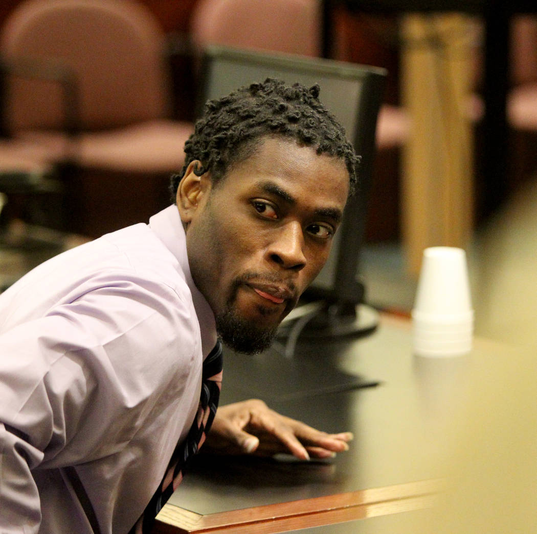 Bryan Clay prepares to stand after being found guilty at the Regional Justice Center on Tuesday ...
