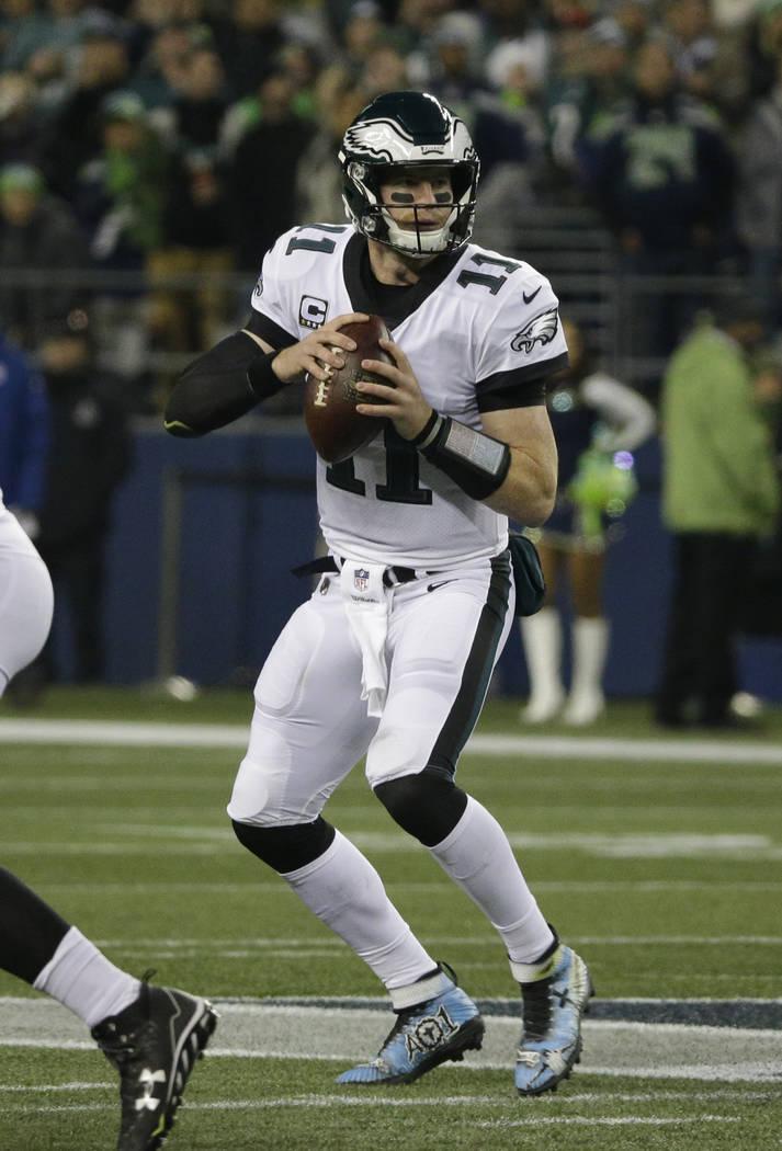 Philadelphia Eagles quarterback Carson Wentz in action against the Seattle Seahawks in the first half of an NFL football game, Sunday, Dec. 3, 2017, in Seattle. (AP Photo/Ted S. Warren)