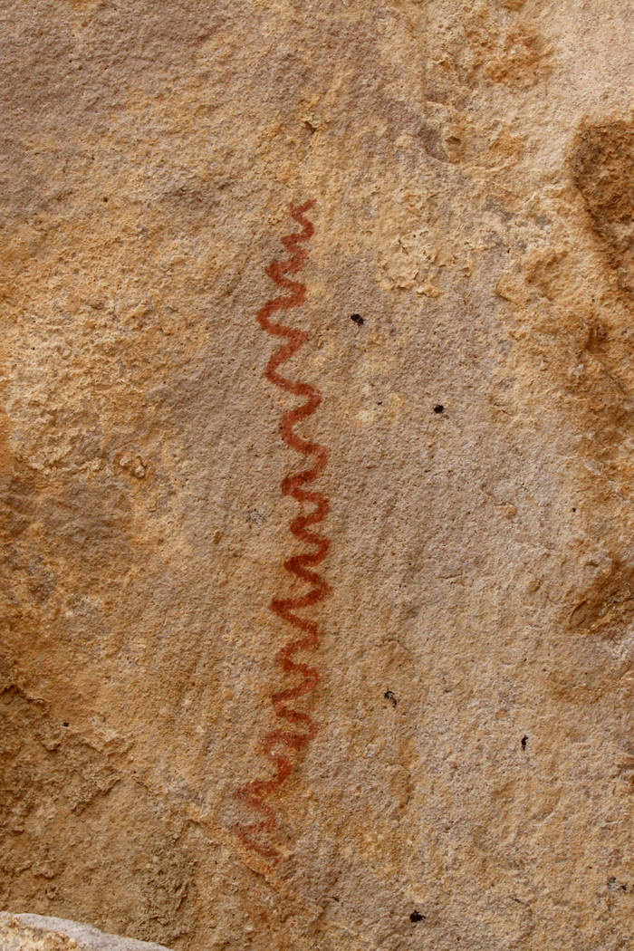 Dozens of petroglyphs, which are pecked in the rock, can be found in Keyhole Canyon. There are also a few pictographs, painted on rock, such as this one that perhaps depicts a snake. (Deborah Wall)