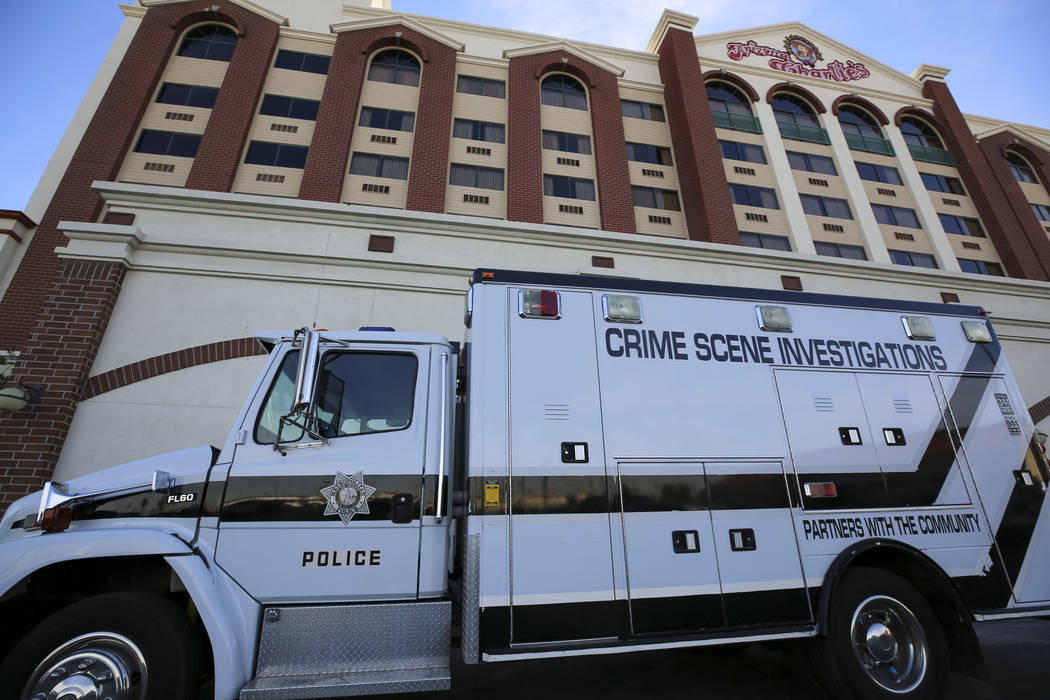 Crime Scene Investigators and Metro detectives are investigating after two security guards were killed in a hotel room at Arizona Charlie’s Decatur hotel-casino in Las Vegas Saturday, Dec. 30, 2 ...
