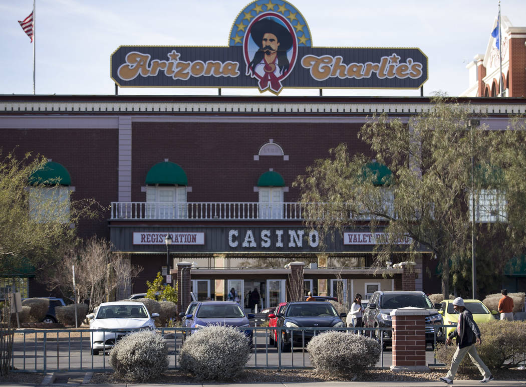 Crime Scene Investigators and Metro detectives are investigating after two security guards were killed in a hotel room at Arizona Charlie’s Decatur hotel-casino in Las Vegas Saturday, Dec.  ...