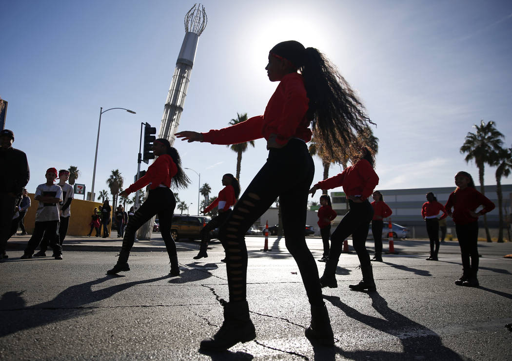 Victoria Beauzier, a 14-year-old dancer in The Rolle Project, practices before for the 36th annual Dr. Martin Luther King Jr. Parade, themed "Living the Dream: Building a Bridge to Unity," in down ...