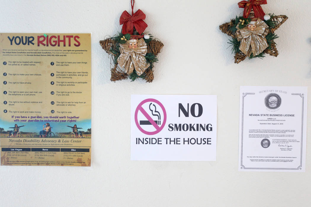 Signs on the wall in a home at 4440 E. St. Louis Ave. in Las Vegas Thursday, Jan. 25, 2018. The house is part of a Nevada state program that pays providers to house and feed mentally ill clients. ...