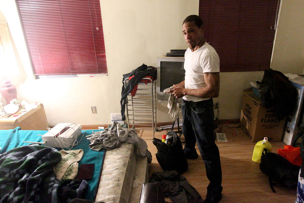 Armello, who declined to give his last name, organizes his belongings Gary's room at 724 N. 9th St. in downtown Las Vegas Thursday, Jan. 25, 2018. Armello said that he doesn't live at the home but ...