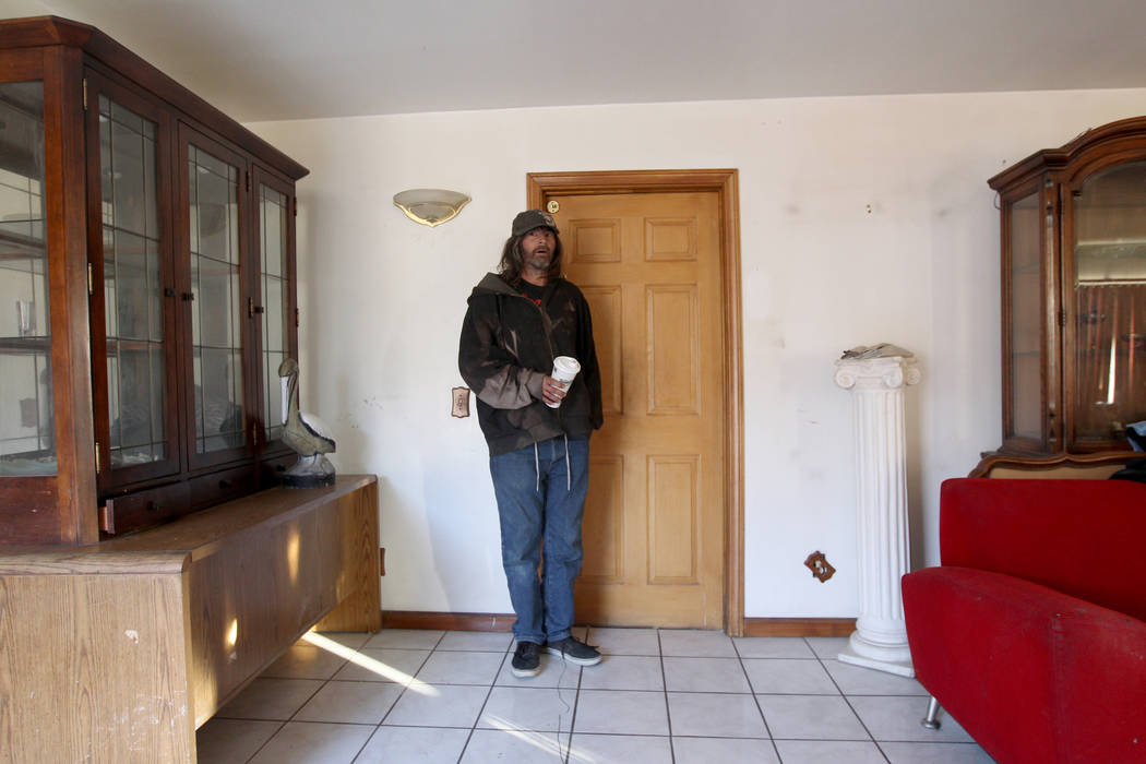 Andy Impereti emerges from his room at 724 N. 9th St. in downtown Las Vegas Friday, Jan. 26, 2018. The home was part of a Nevada state program that pays providers to house and feed mentally ill cl ...