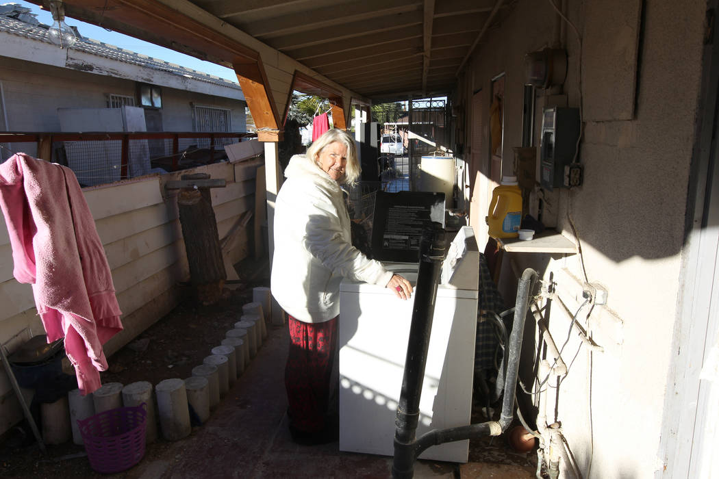 Linda Pellow does laundry at 724 N. 9th St. in downtown Las Vegas Friday, Jan. 26, 2018. The home was part of a Nevada state program that pays providers to house and feed mentally ill clients. K.M ...
