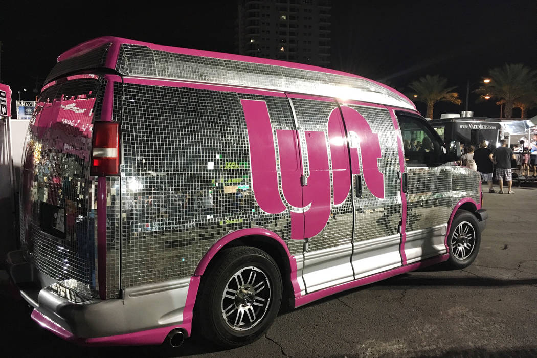 A Lyft van sits at First Friday in downtown Las Vegas on July 1, 2016. (Las Vegas Review-Journal)
