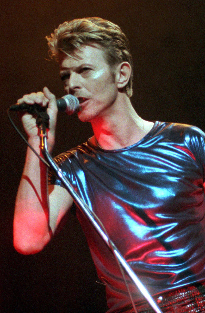 CORRECTS DATE OF DEATH TO SUNDAY, JAN. 10, 2016 - FILE - In this Sept. 14, 1995, file photo, David Bowie performs during a concert in Hartford, Conn. Bowie, the innovative and iconic singer whose  ...