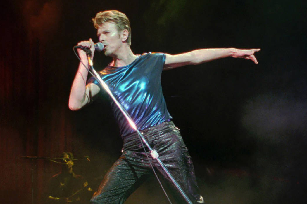 In this Sept. 14, 1995, file photo, David Bowie performs in Hartford, Conn. Bowie, the innovative and iconic singer whose illustrious career lasted five decades, died Sunday, Jan. 10, 2016, after  ...