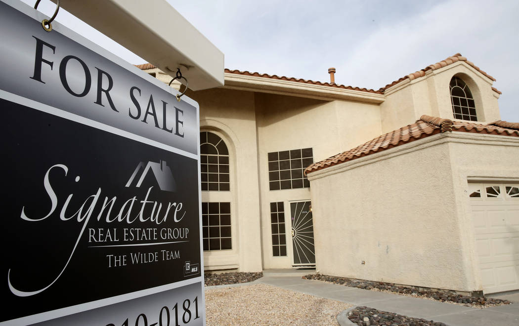 A for sale sign is displayed in front of a home at Gentle Bay Avenue near Windmill Lane Wednesday, Nov. 15, 2017, in Las Vegas. (Bizuayehu Tesfaye/Las Vegas Review-Journal) @bizutesfaye