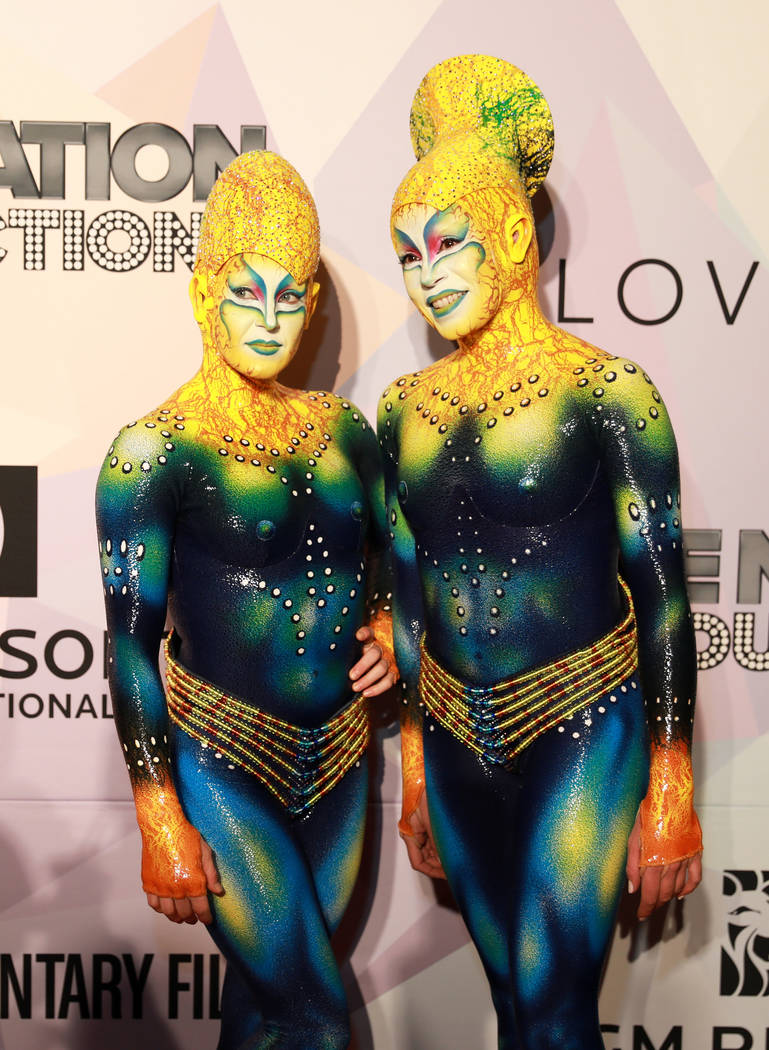 Artists from KA by Cirque du Soleil pose during a VIP screening of "Believer," the documentary by Imagine Dragons frontman Dan Reynolds, at KA Theatre at MGM Grand in Las Vegas on Thursd ...