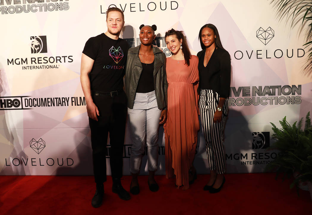 Dan Reynolds, Sequoia Holmes, Aja Volkman  and Moriah Jefferson pose before a VIP screening of "Believer," the documentary by Imagine Dragons frontman, Reynolds, at KA Theatre at MGM Gra ...