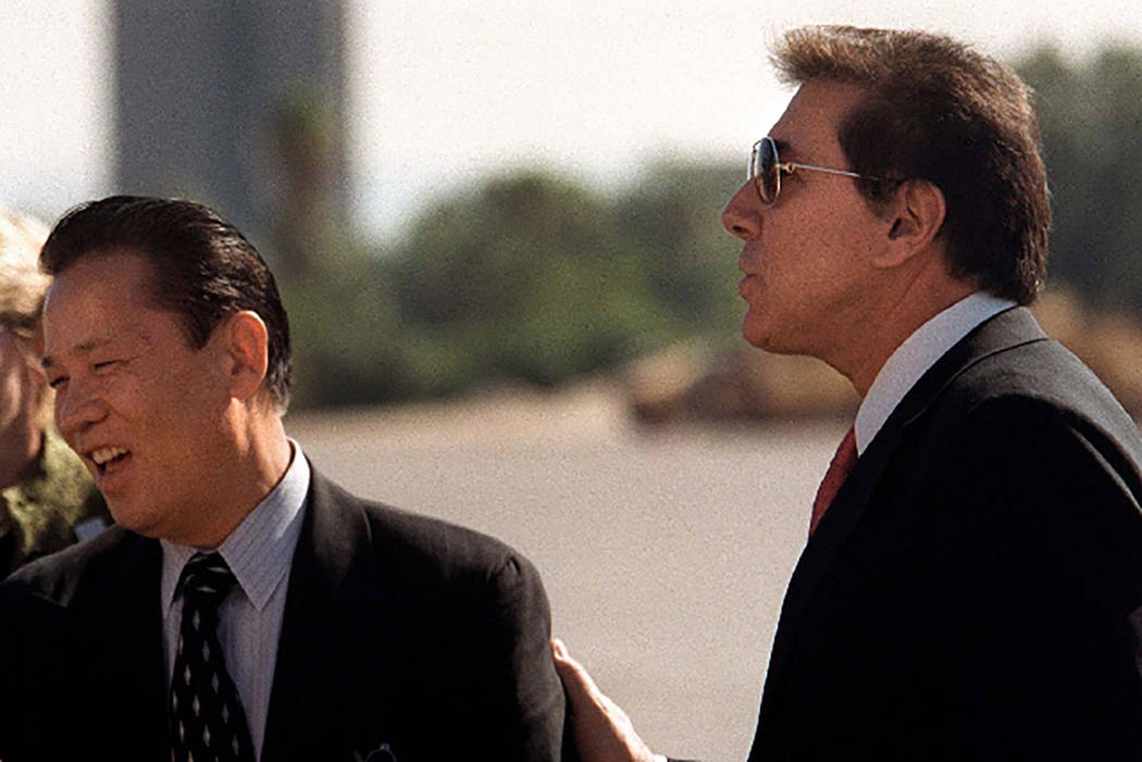 Kazuo Okada, left, and Steve Wynn are seen in 2002. (Las Vegas Review-Journal)